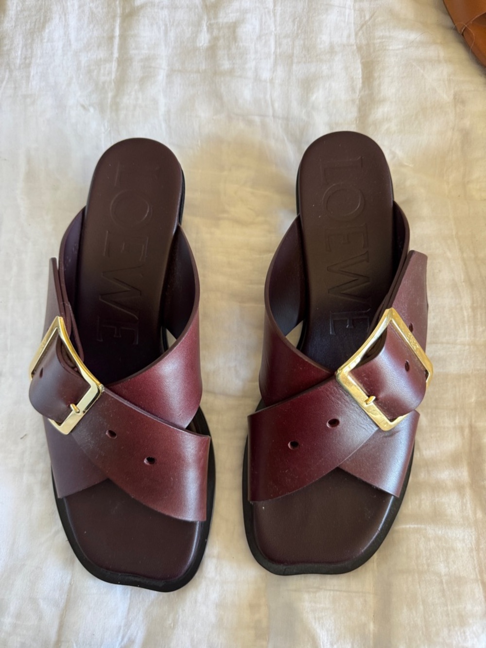 Loewe Wine Leather Cross-Strap Slides with Gold Buckles